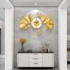 ginee_20251105172552853_2270438211.jpg TaffHOME Jam Dinding Besi Elegan Ginkgo Biloba Silent Movement 78.5cm - 2886J