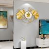 ginee_20251105172552943_0915856574.jpg TaffHOME Jam Dinding Besi Elegan Ginkgo Biloba Silent Movement 78.5cm - 2886J