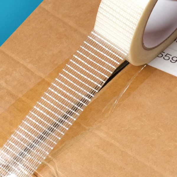 ginee_20251117180437859_3870264598.jpg TaffPACK Lakban Super Strong Fiber 0.14mm Tape Grid 25M - B089