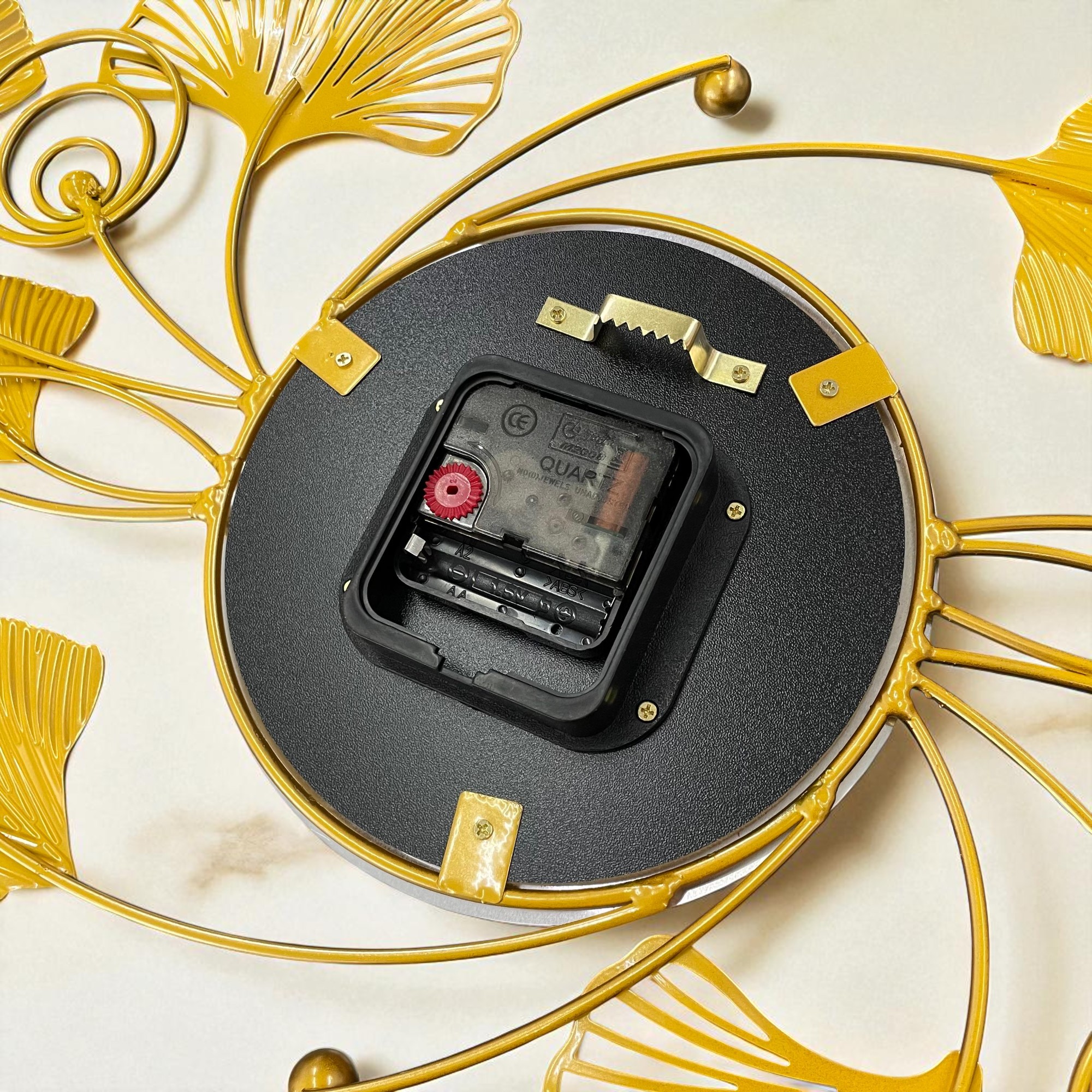 ginee_20260120183406810_4454577648.jpg TaffHOME Jam Dinding Besi Elegan Ginkgo Biloba Silent Movement 80cm - 2873