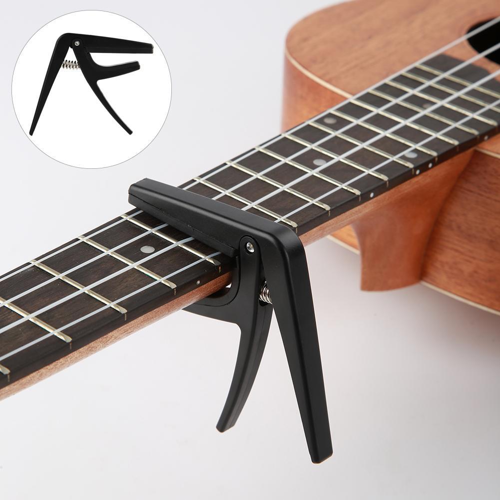 ginee_20260220120108527_7915956506.jpg TaffSTUDIO Capo Ukulele Simple Design - JPC-02