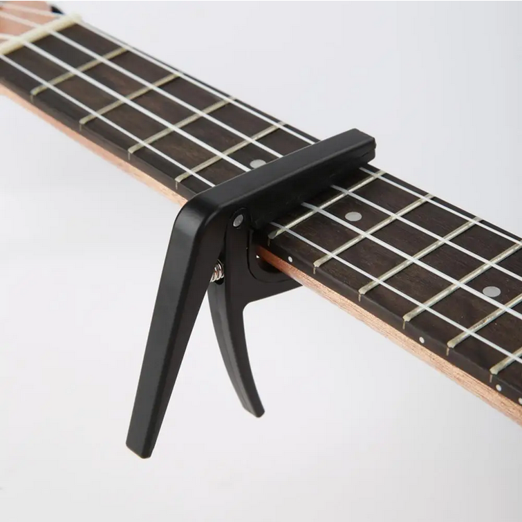 ginee_20260220120108713_7308551061.png TaffSTUDIO Capo Ukulele Simple Design - JPC-02