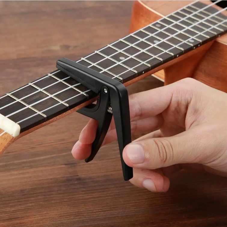 ginee_20260220120108764_0764206839.png TaffSTUDIO Capo Ukulele Simple Design - JPC-02