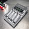 Taffware Charger Baterai 4 Slot AA AAA Ni-MH NiCD LCD Display - C903W